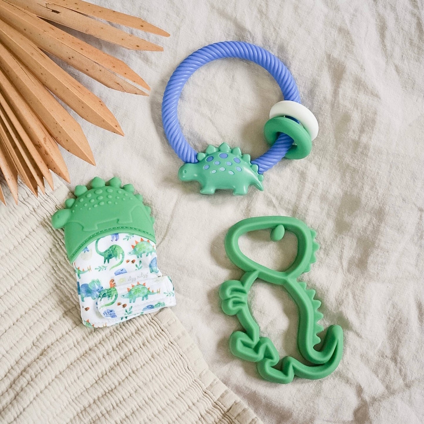 Itzy Mitt™ Silicone Teething Mitts: Bow